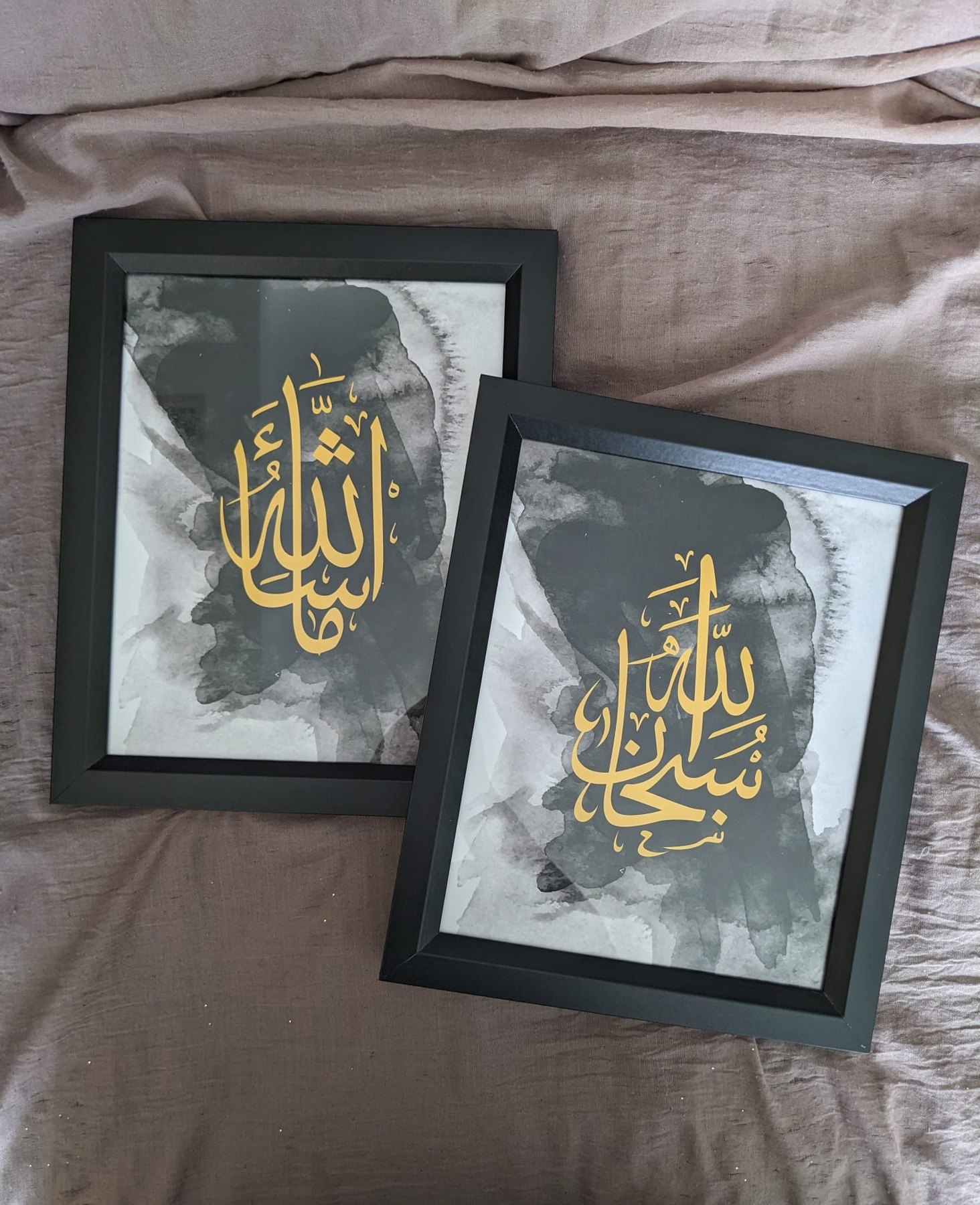 Gold calligraphy in black frames.